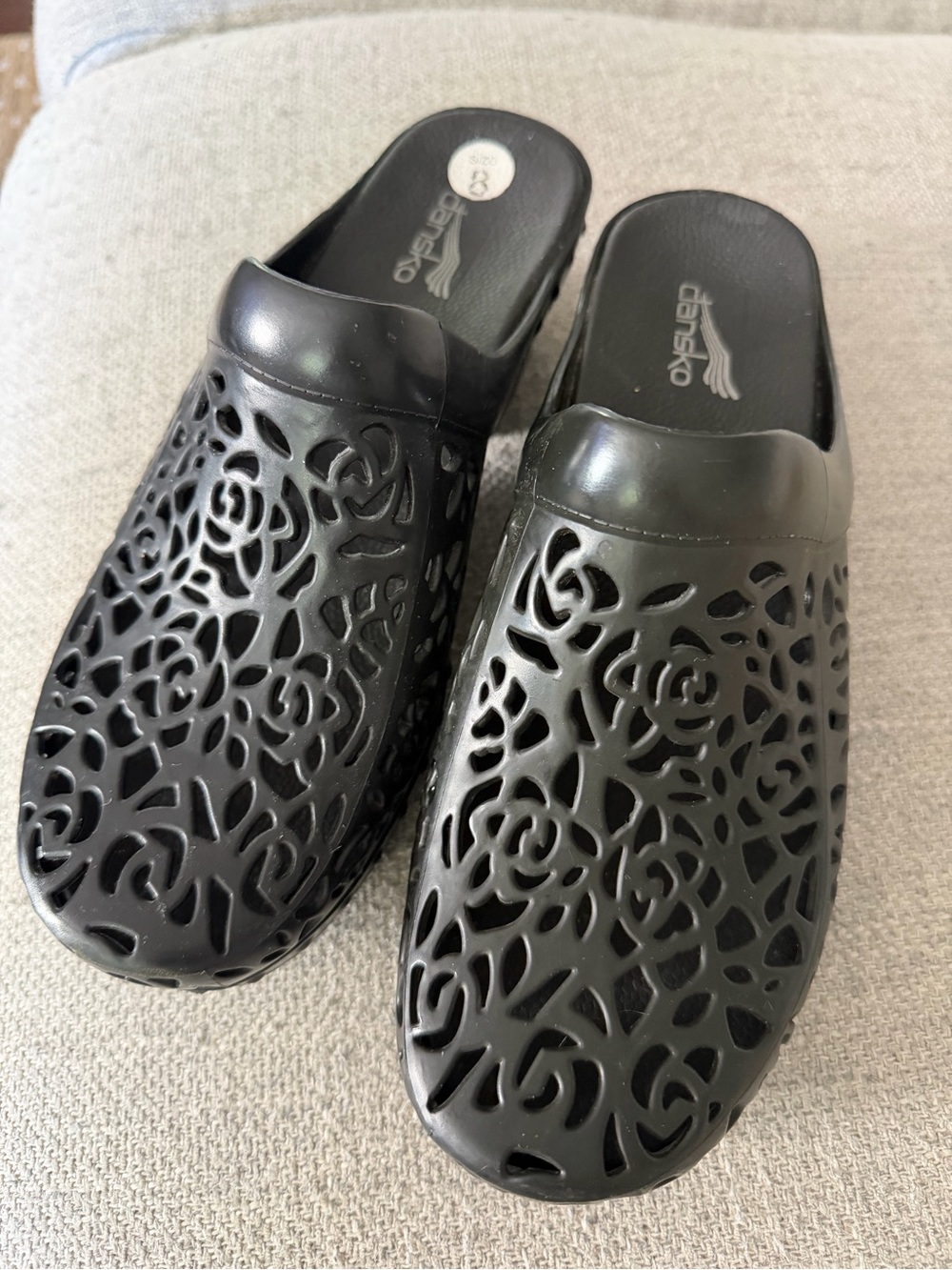 Dansko Black Floral Cutout Slip-On Clogs
